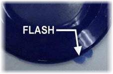 Flash defect in injection molding